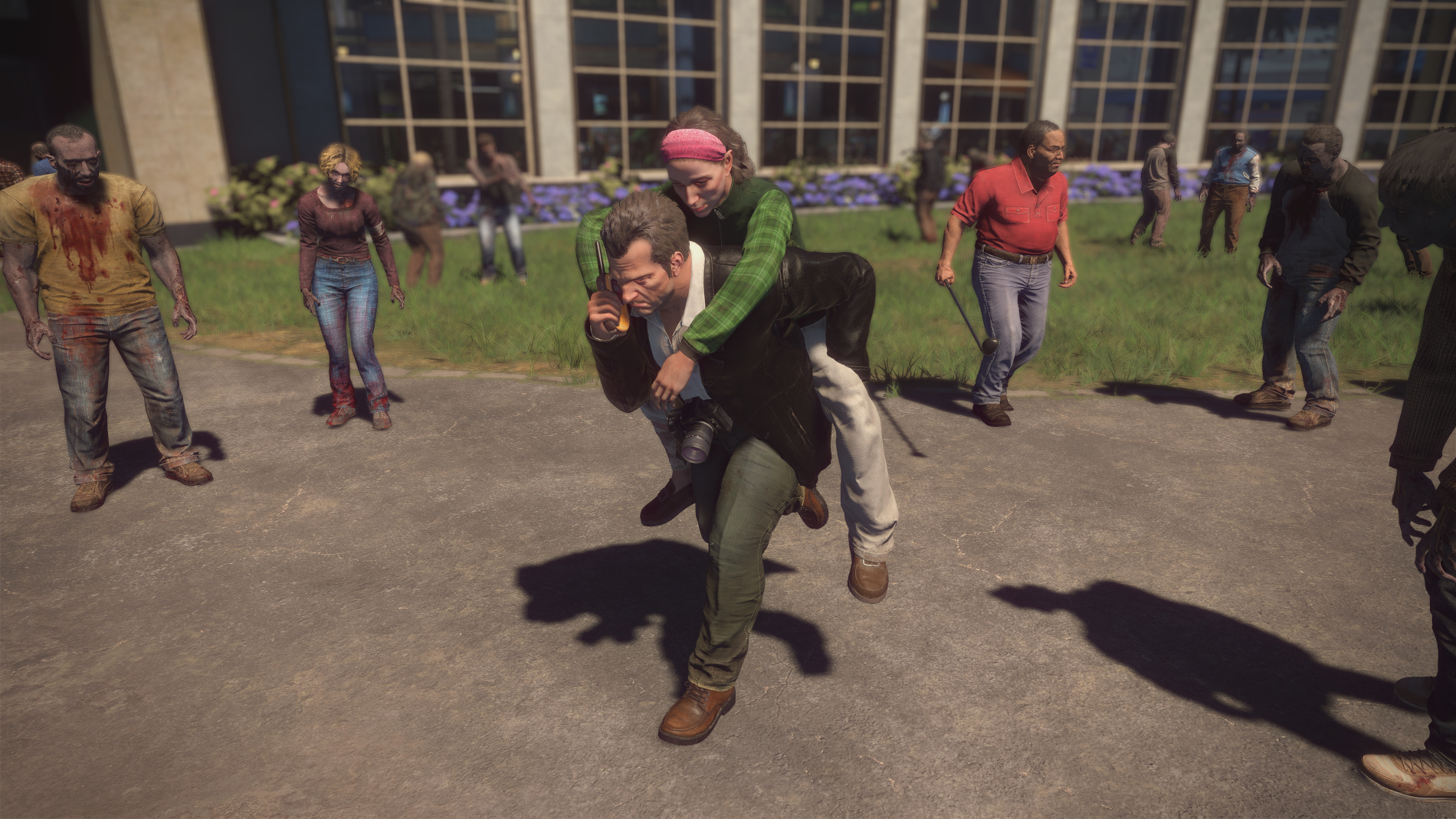 Frank West saving a bystander in Dead Rising Deluxe Remaster